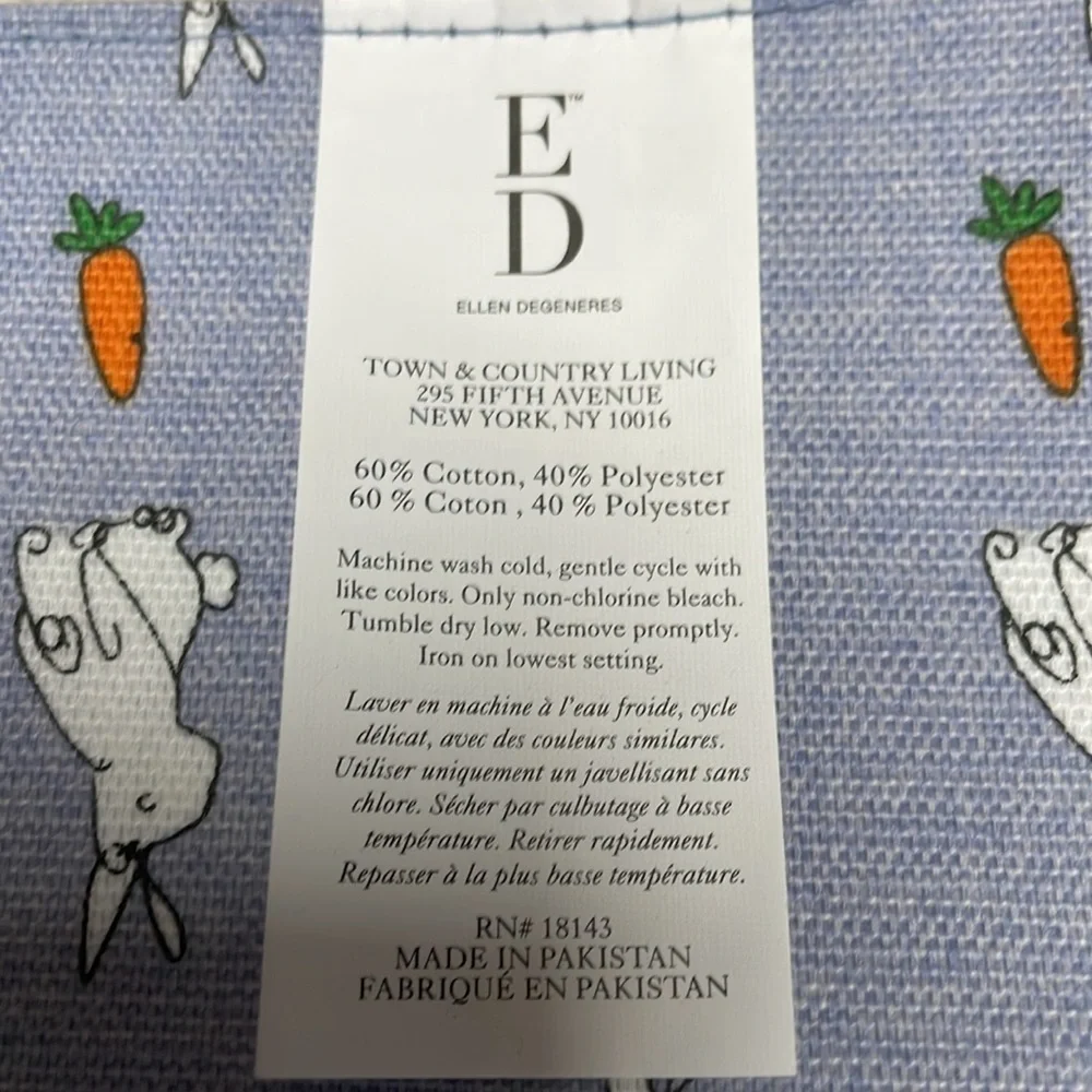 3 NWT Ellen Degeneres bunny/carrot table placemats. 18” x 13” blue background.